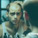 a balding man inspecting himself in a mirror - hemppedia