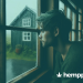 a man looking out of a window on a rainy day - hemppedia